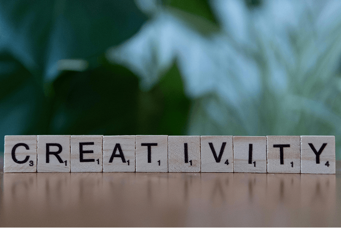 Wooden blocks with letters that make up the word creativity