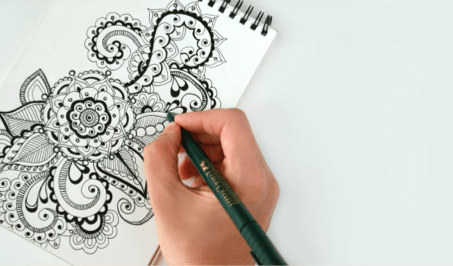 Person drawing doodles