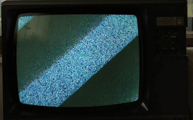 Old TV with white noise image