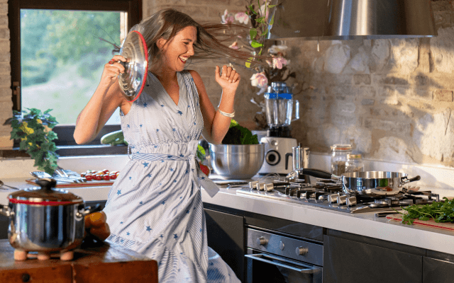 Woman dancing in the kitchen