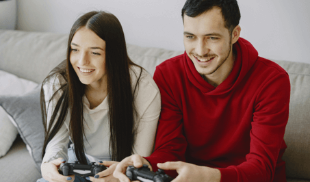 Man and woman playing video game